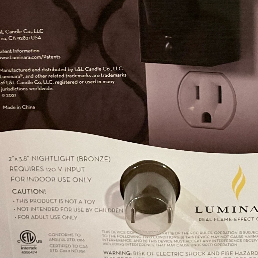 Luminara Electric Plug-In Bronze Nightlight. - Picture 3 of 3